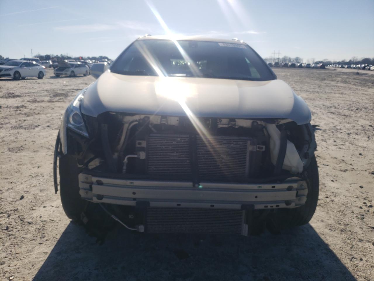 2017 Cadillac XT5 VIN 1GYKNARS0HZ124016 Copart auction photo, front end / side damage thumbnail 5