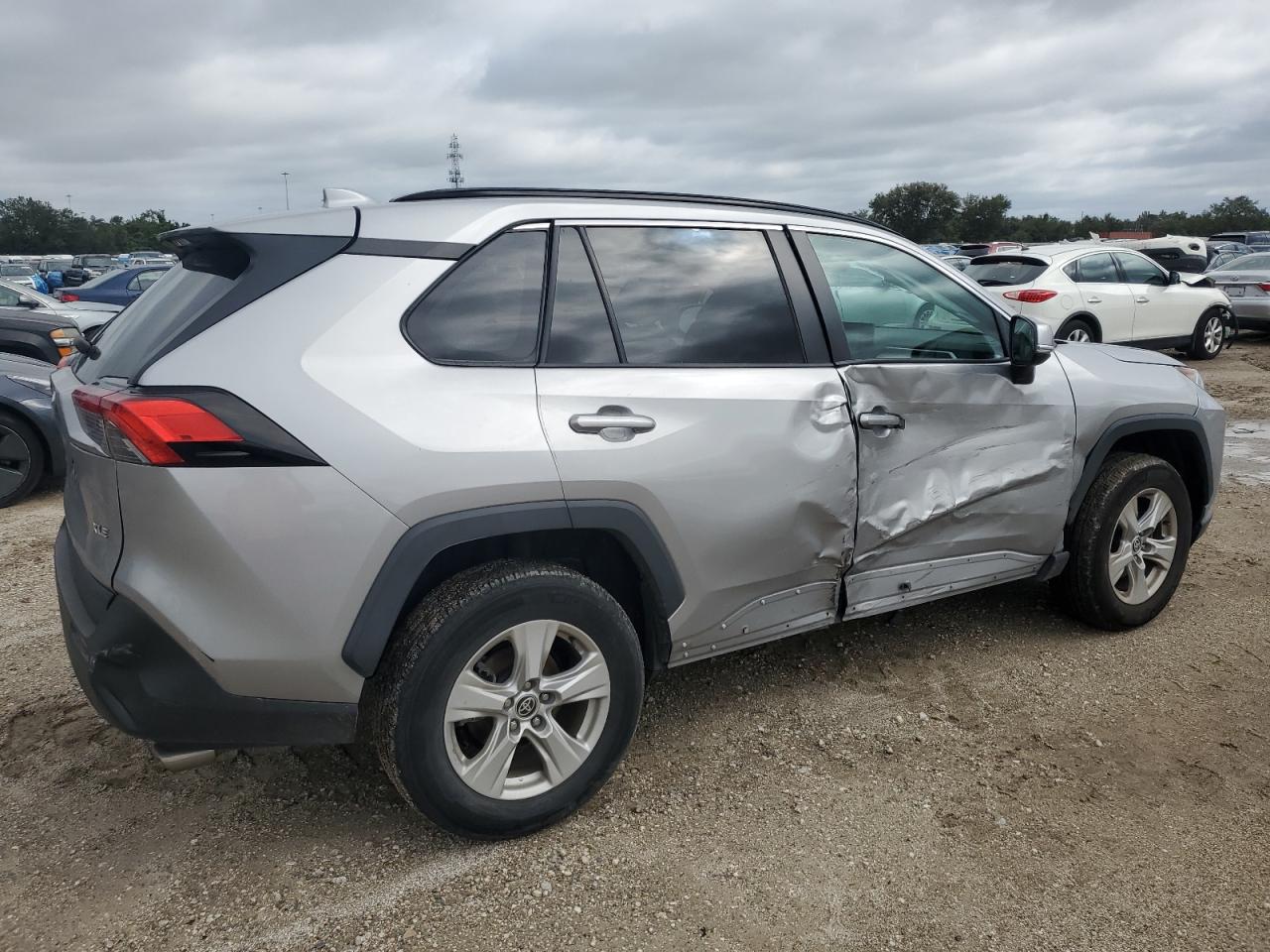 2021 Toyota RAV 4 VIN 2T3W1RFV2MC114678 Copart auction photo, side damage thumbnail 3