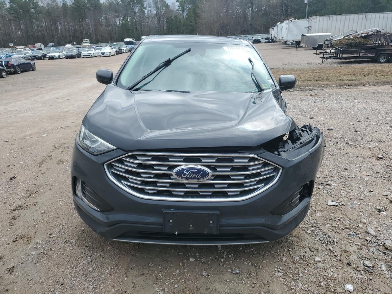 2021 Ford Edge VIN 2FMPK4J99MBA01922 Copart auction photo, front end / undercarriage damage thumbnail 5