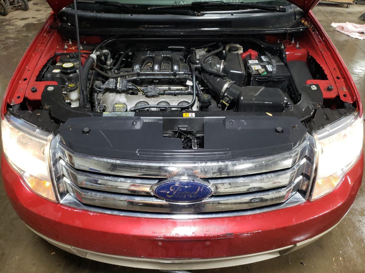 2009 Ford Taurus VIN 1FMDK07W59GA03692 Copart auction photo, all over damage thumbnail 11