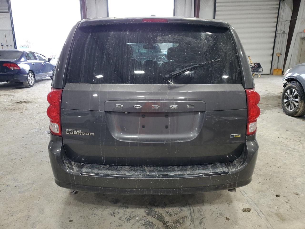 2019 Dodge Caravan VIN 2C4RDGCG5KR723185 Copart auction photo, side damage thumbnail 6