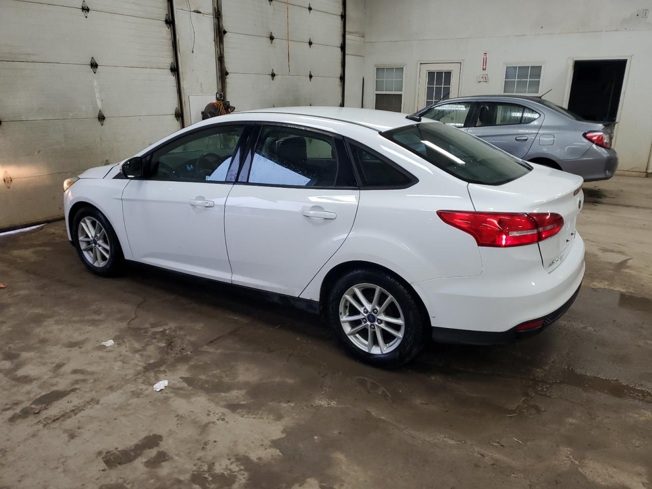 2015 Ford Focus VIN 1FADP3F20FL313084 Copart auction photo, front end damage thumbnail 2