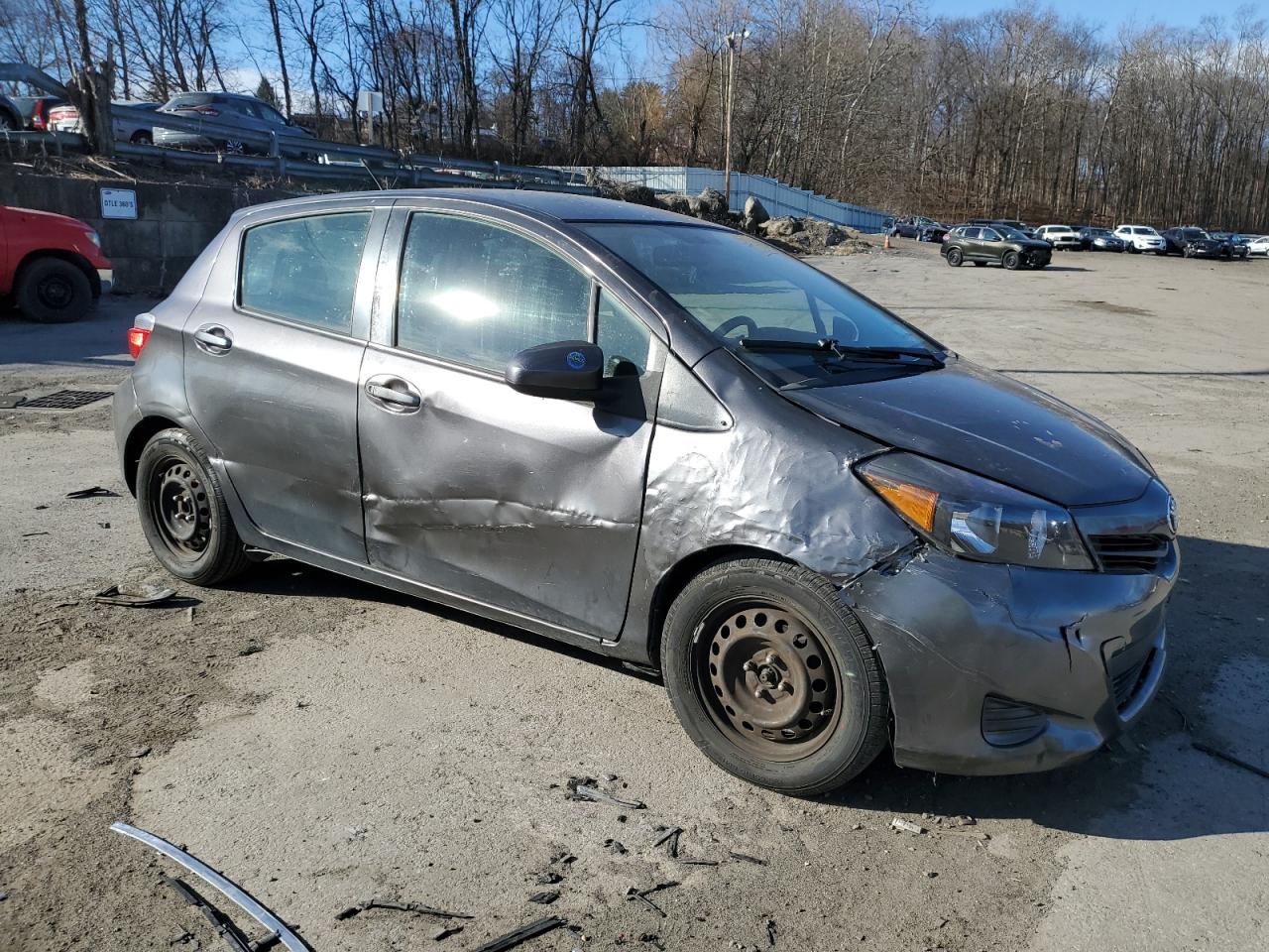 2012 Toyota Yaris VIN JTDKTUD38CD509391 Copart auction photo, side / front end damage thumbnail 4