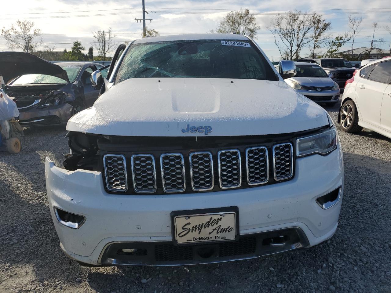 2021 Jeep Grand Cherokee VIN 1C4RJFCG3MC511044 Copart auction photo, front end / side damage thumbnail 5