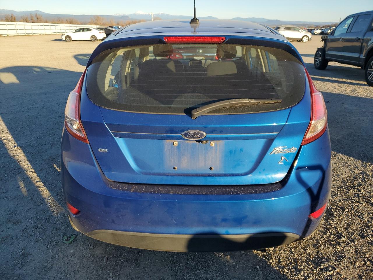 2018 Ford Fiesta VIN 3FADP4EJ2JM101681 Copart auction photo, side damage thumbnail 6