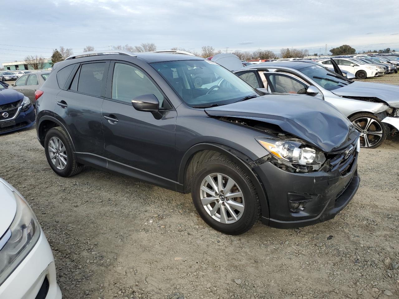 2016 Mazda CX-5 VIN JM3KE2CY7G0845517 Copart auction photo, front end damage thumbnail 4