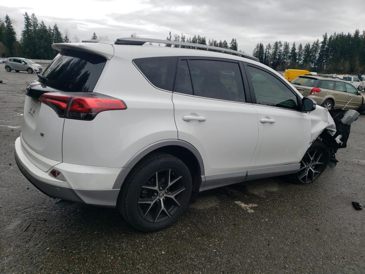 2017 Toyota RAV 4 VIN 2T3NFREV6HW346056 Copart auction photo, front end damage thumbnail 3