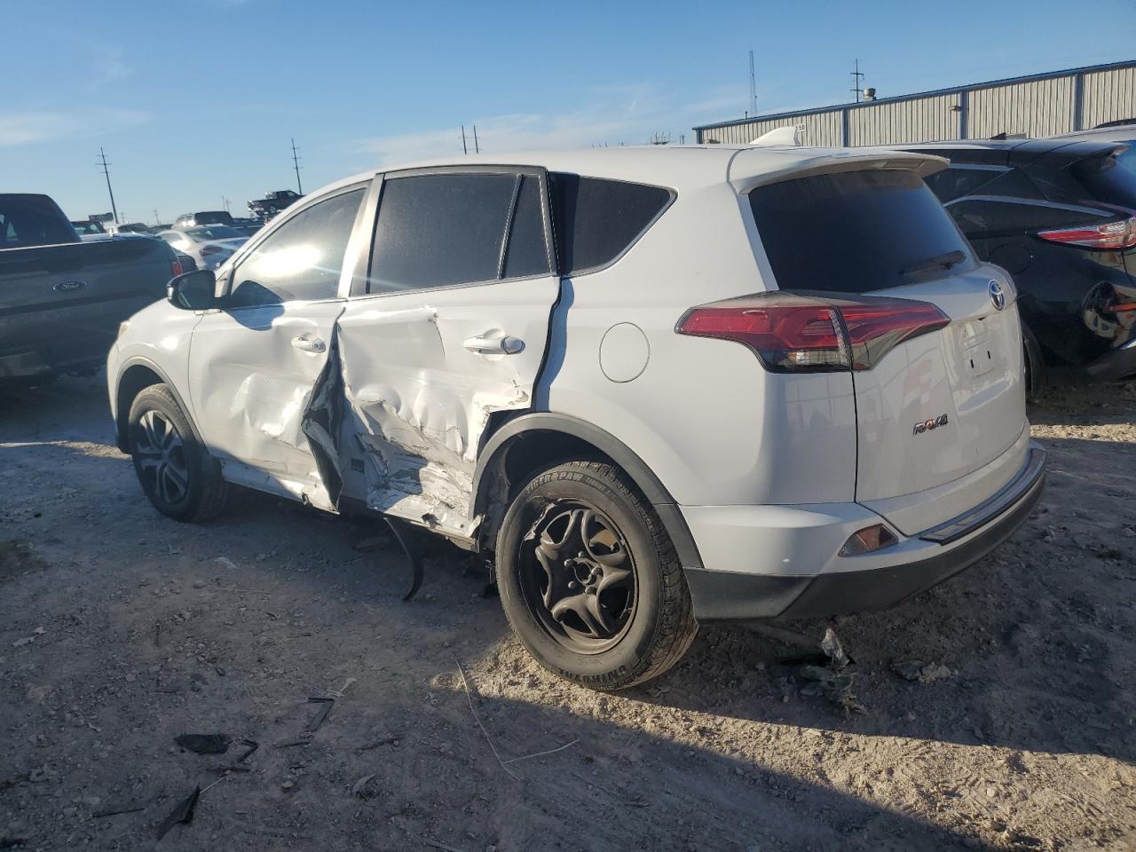 2017 Toyota RAV 4 VIN 2T3ZFREV0HW383265 Copart auction photo, side / front end damage thumbnail 2