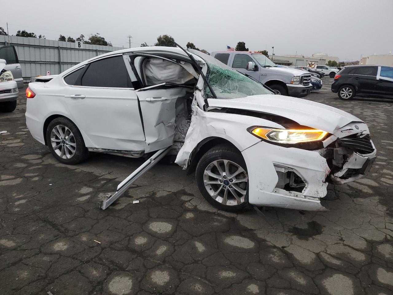 2019 Ford Fusion VIN 3FA6P0MU2KR117557 Copart auction photo, all over damage thumbnail 4