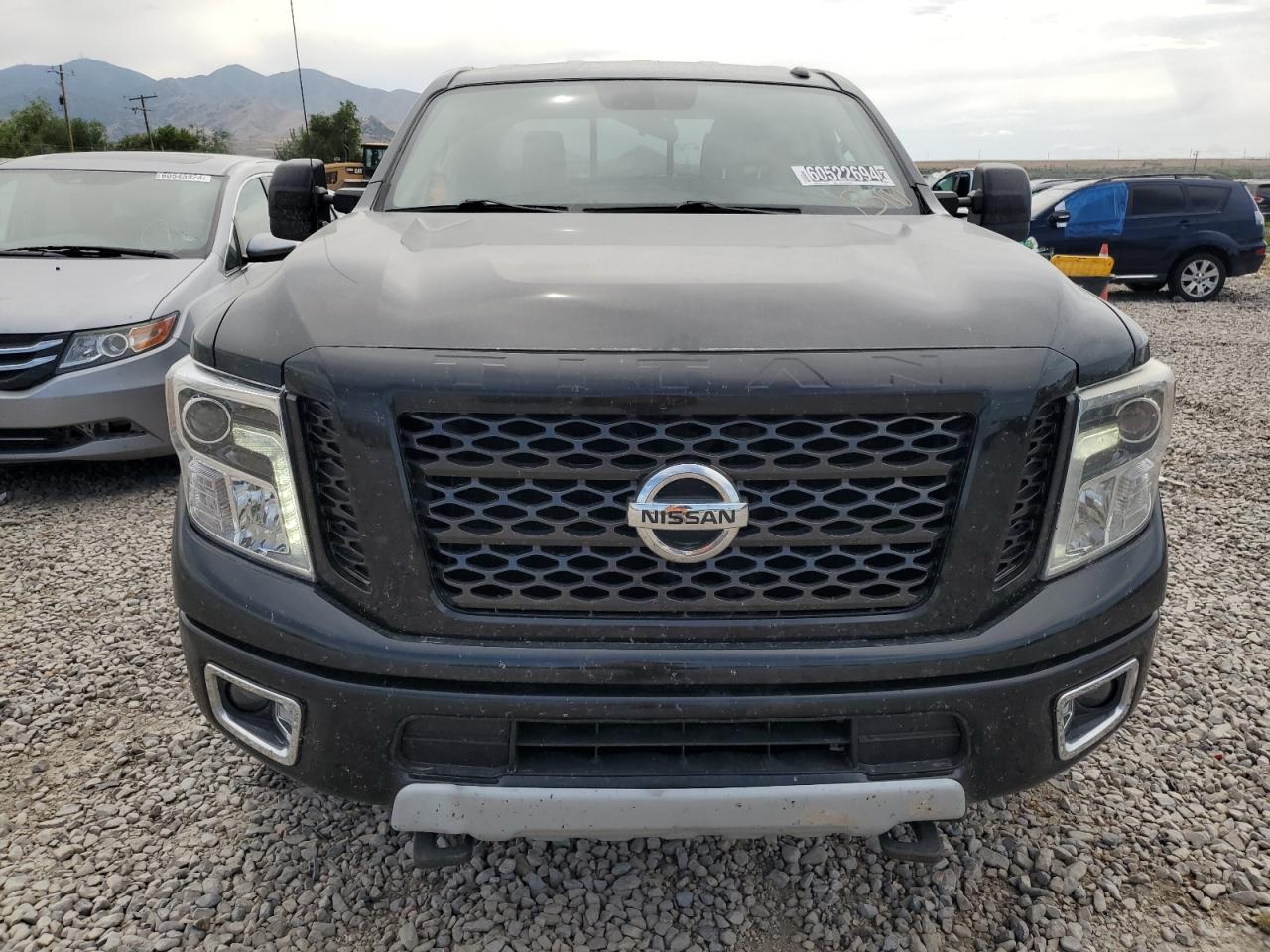 2017 Nissan Titan VIN 1N6BA1F47HN550894 Copart auction photo, side damage thumbnail 5