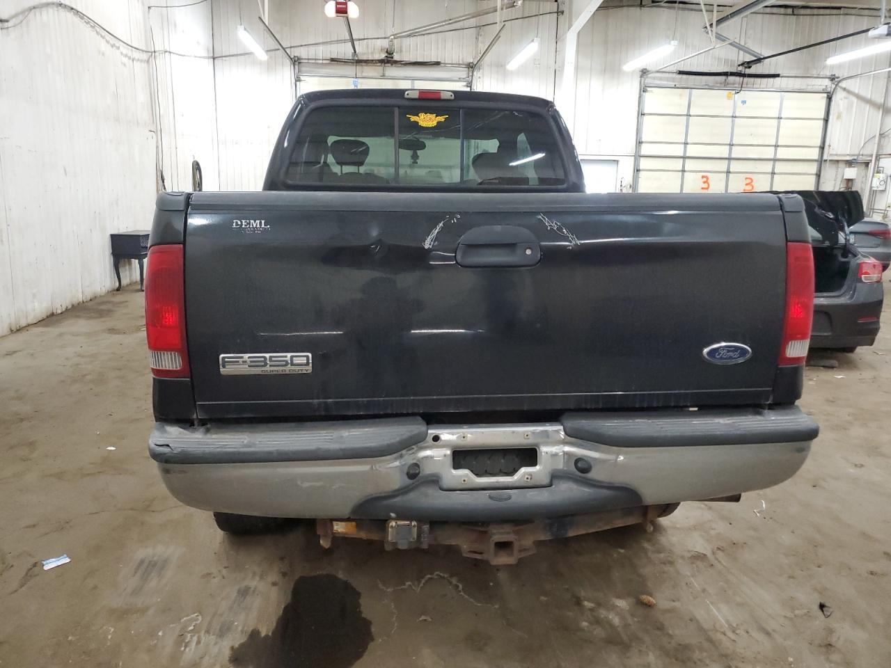 2005 Ford F350 VIN 1FTWX31P55EC12132 Copart auction photo, burn damage thumbnail 6
