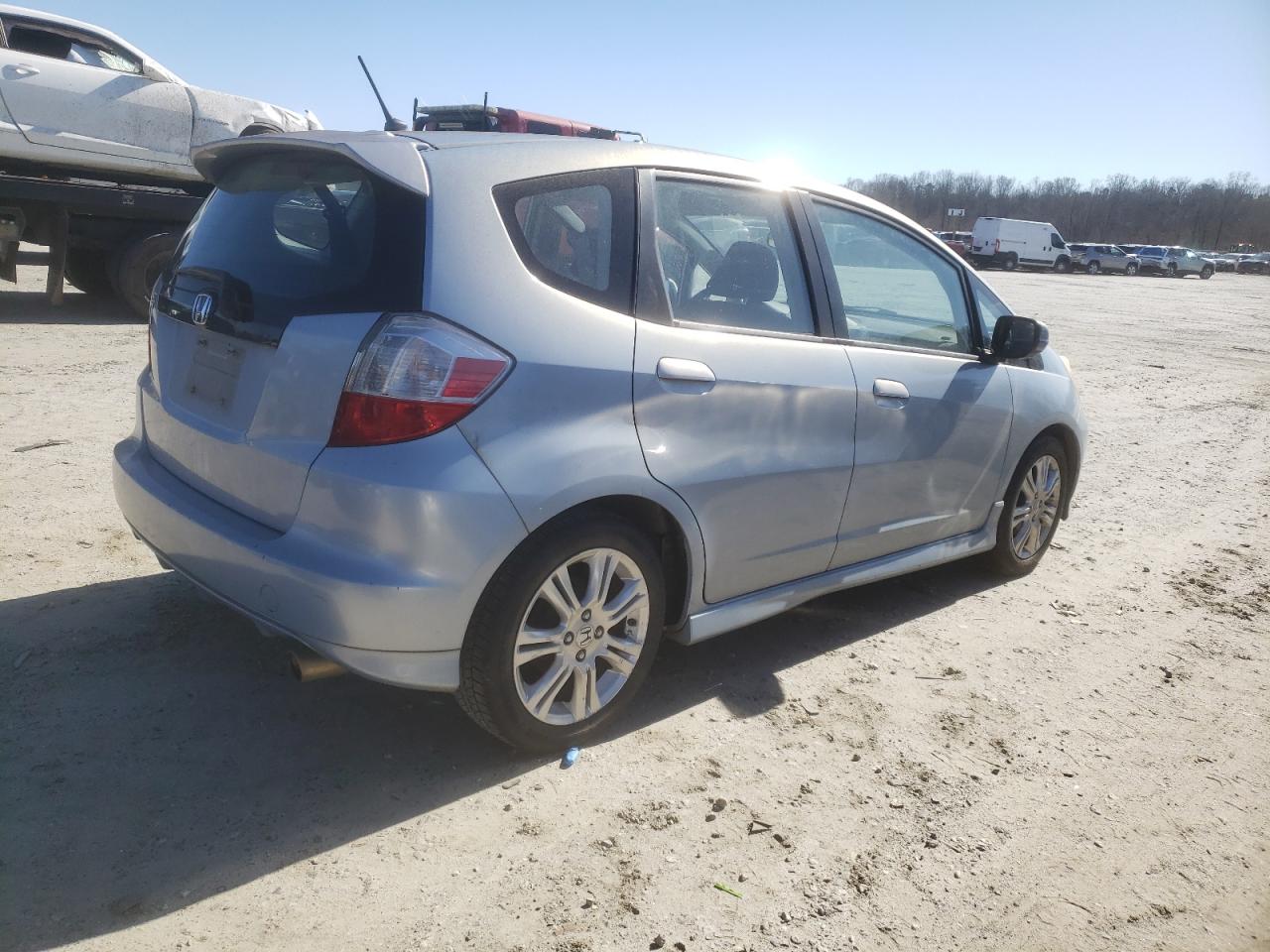 2010 Honda Fit VIN JHMGE8H40AC008393 Copart auction photo, front end / minor dent/scratches damage thumbnail 3