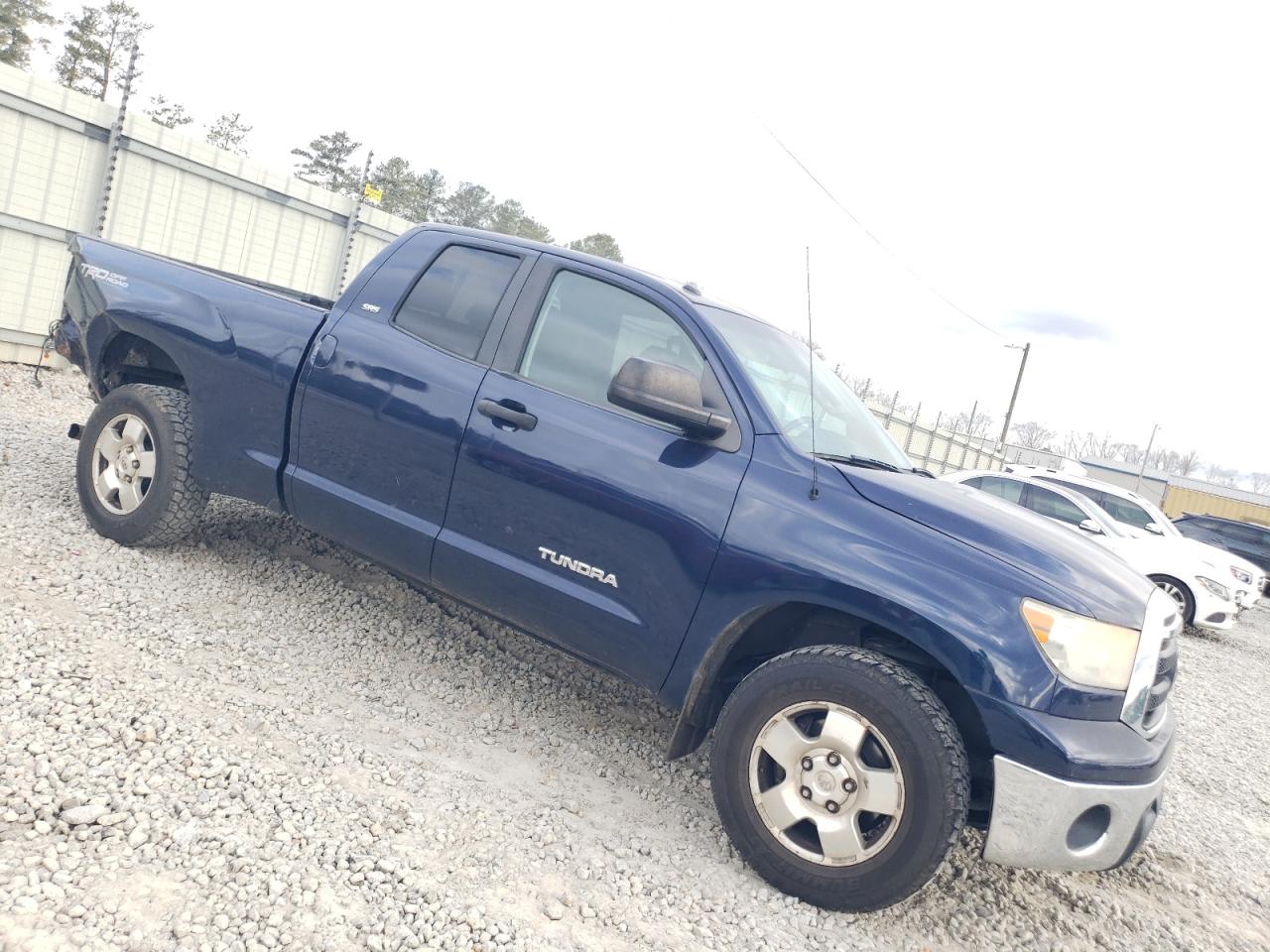 2011 Toyota Tundra VIN 5TFRM5F18BX027725 Copart auction photo, rear end / minor dent/scratches damage thumbnail 4