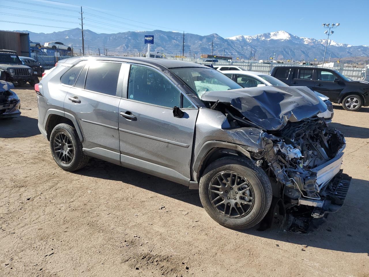 2022 Toyota RAV 4 VIN 2T3F1RFV5NW292410 Copart auction photo, front end / side damage thumbnail 4