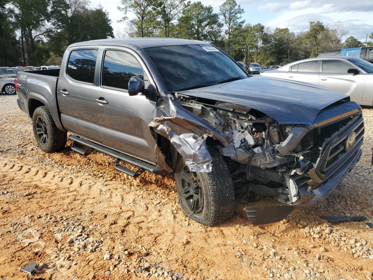 2021 Toyota Tacoma VIN 3TYAX5GN9MT029213 Copart auction photo, front end / side damage thumbnail 4
