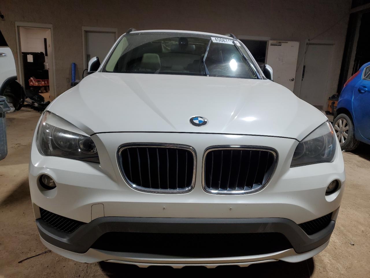2015 BMW X1 VIN WBAVM1C57FV316575 Copart auction photo, side damage thumbnail 5