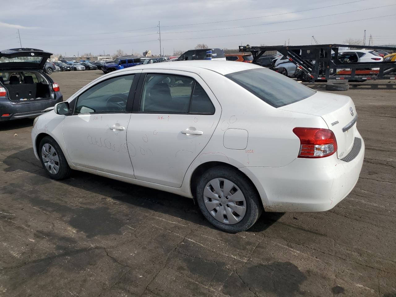 2010 Toyota Yaris VIN JTDBT4K33A4064137 Copart auction photo, all over damage thumbnail 2