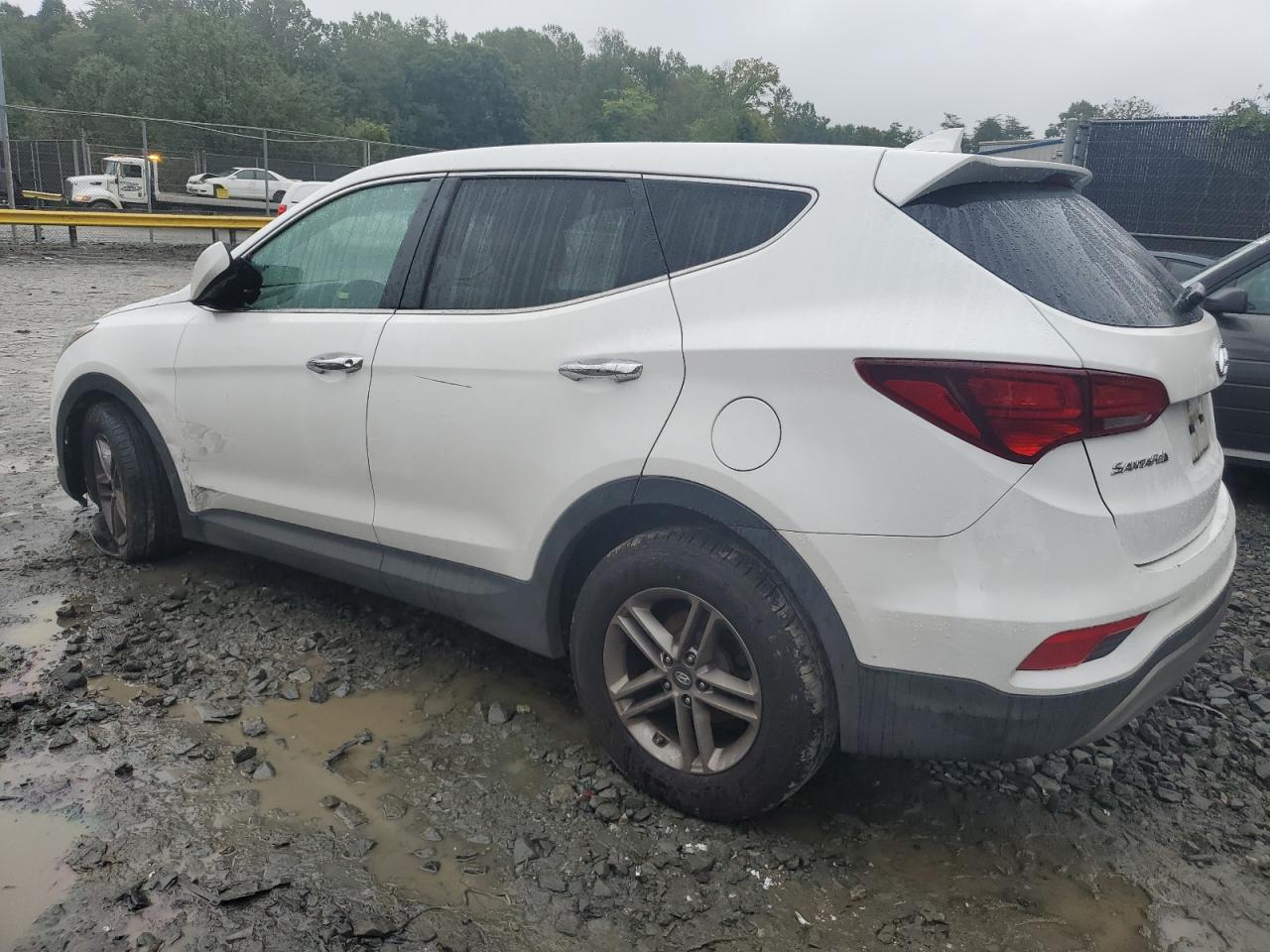 2017 Hyundai Santa Fe VIN 5NMZTDLB7HH026268 Copart auction photo, minor dent/scratches damage thumbnail 2
