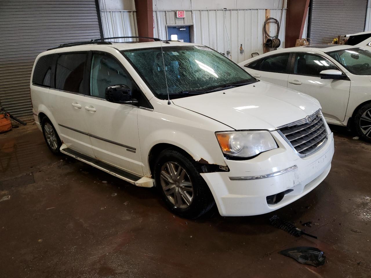 2010 Chrysler Town & Country VIN 2A4RR5DX8AR290443 Copart auction photo, front end / side damage thumbnail 4