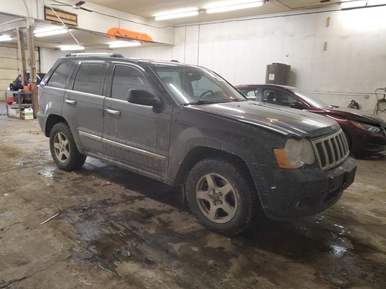 2010 Jeep Grand Cherokee VIN 1J4RR5GT8AC115188 Copart auction photo, front end damage thumbnail 4