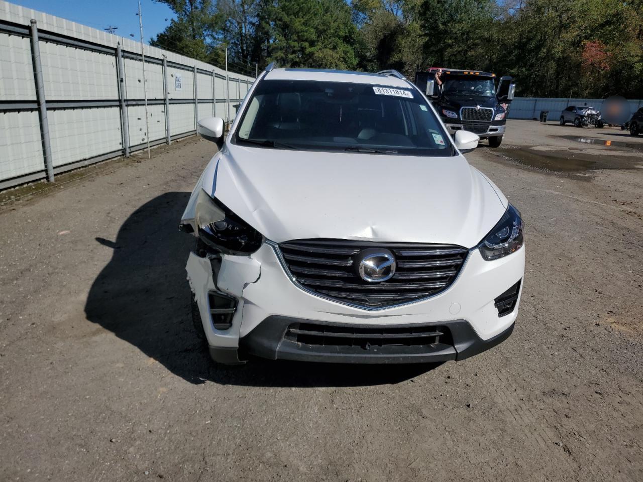 2016 Mazda CX-5 VIN JM3KE2DYXG0702124 Copart auction photo, front end / minor dent/scratches damage thumbnail 5