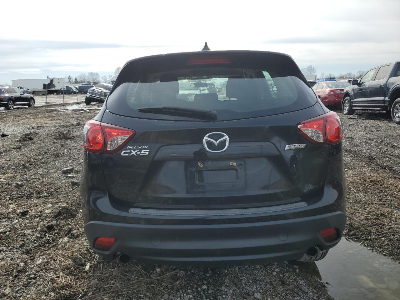 2016 Mazda CX-5 VIN JM3KE2BY6G0879871 Copart auction photo, front end / minor dent/scratches damage thumbnail 6