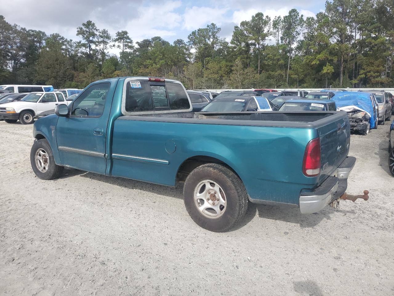 1997 Ford F-150 VIN 1FTDF1763VNA05977 Copart auction photo, front end / side damage thumbnail 2