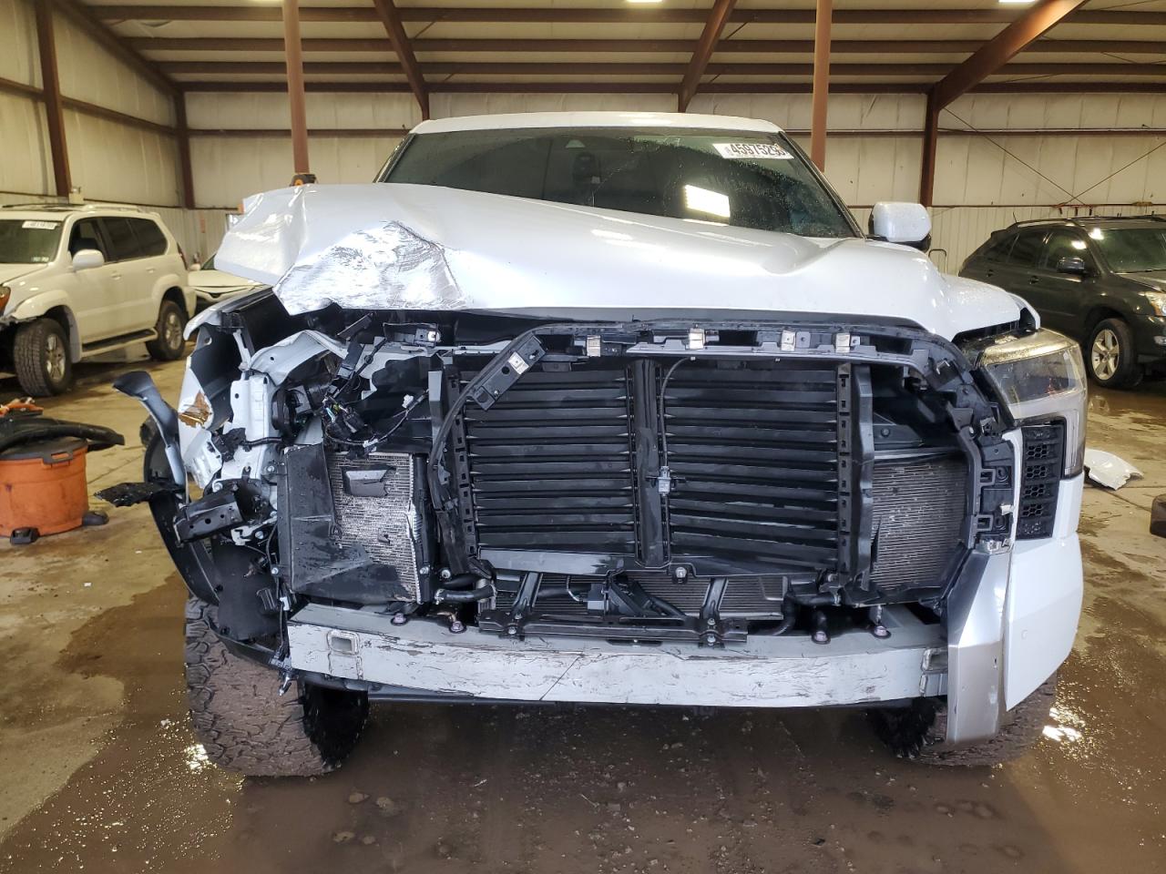 2023 Toyota Tundra VIN 5TFJA5EC8PX014117 Copart auction photo, front end damage thumbnail 5