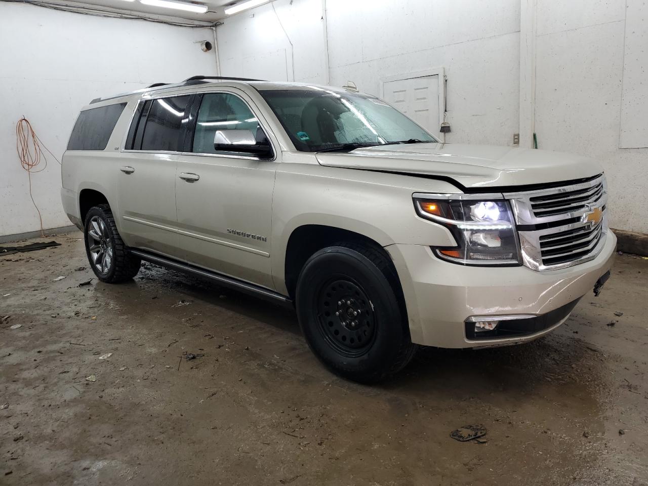 2016 Chevrolet Suburban VIN 1GNSKJKC7GR443355 Copart auction photo, front end / undercarriage damage thumbnail 4
