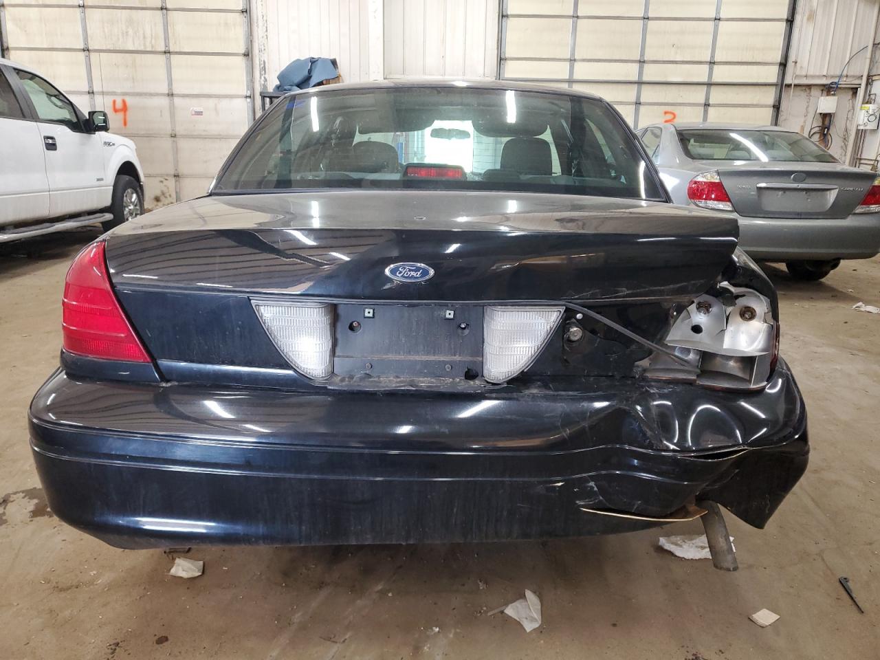 2010 Ford Crown Victoria VIN 2FABP7BV9AX131118 Copart auction photo, rear end damage thumbnail 6