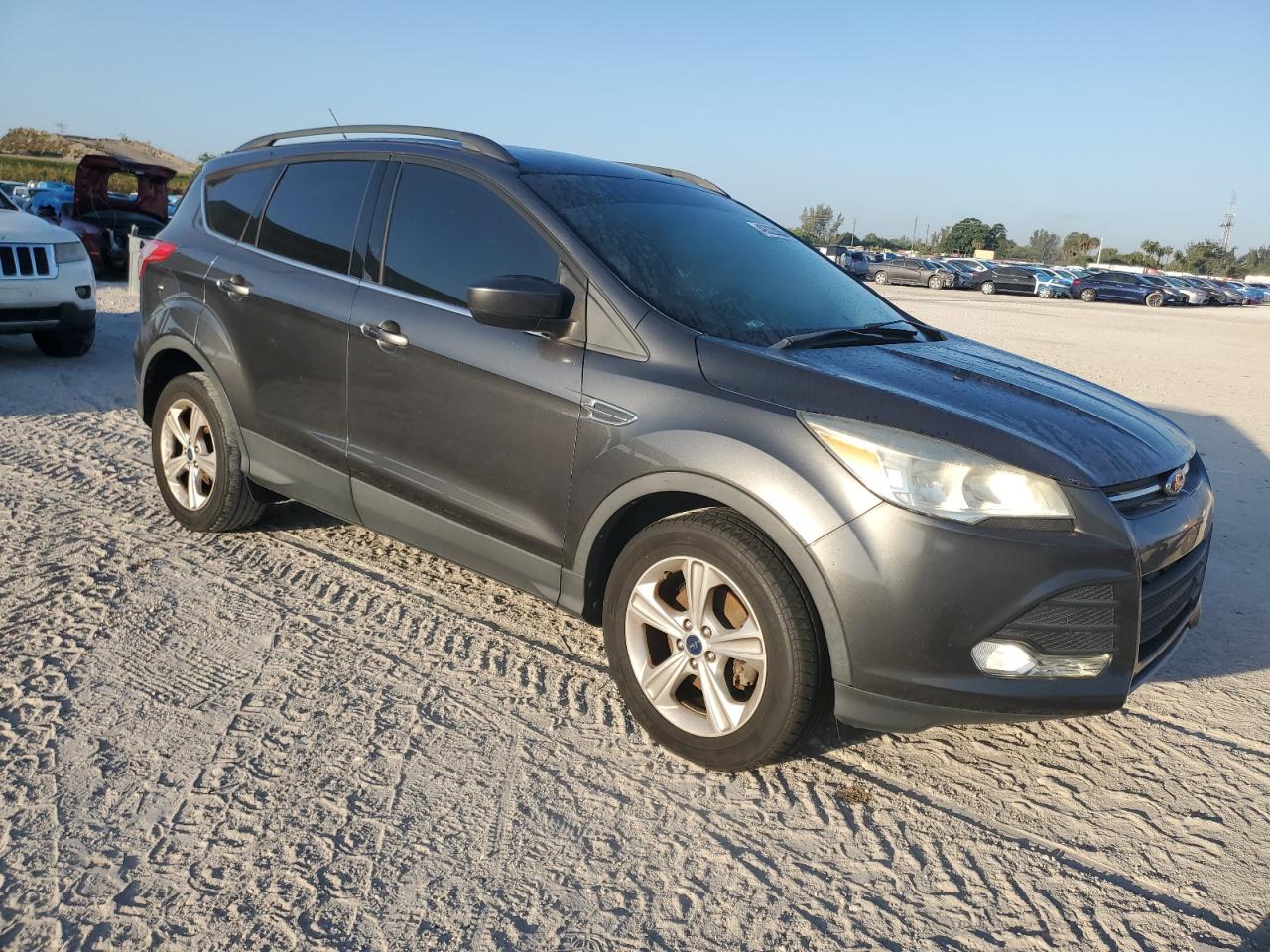 2015 Ford Escape VIN 1FMCU0GX0FUB16493 Copart auction photo, minor dent/scratches damage thumbnail 4