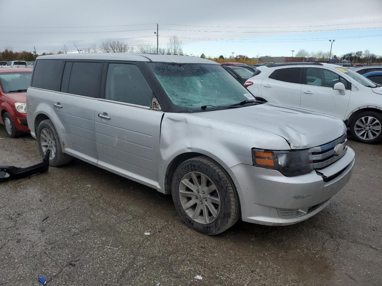 2011 Ford Flex VIN 2FMGK5CC1BBD36815 Copart auction photo, top/roof / front end damage thumbnail 4