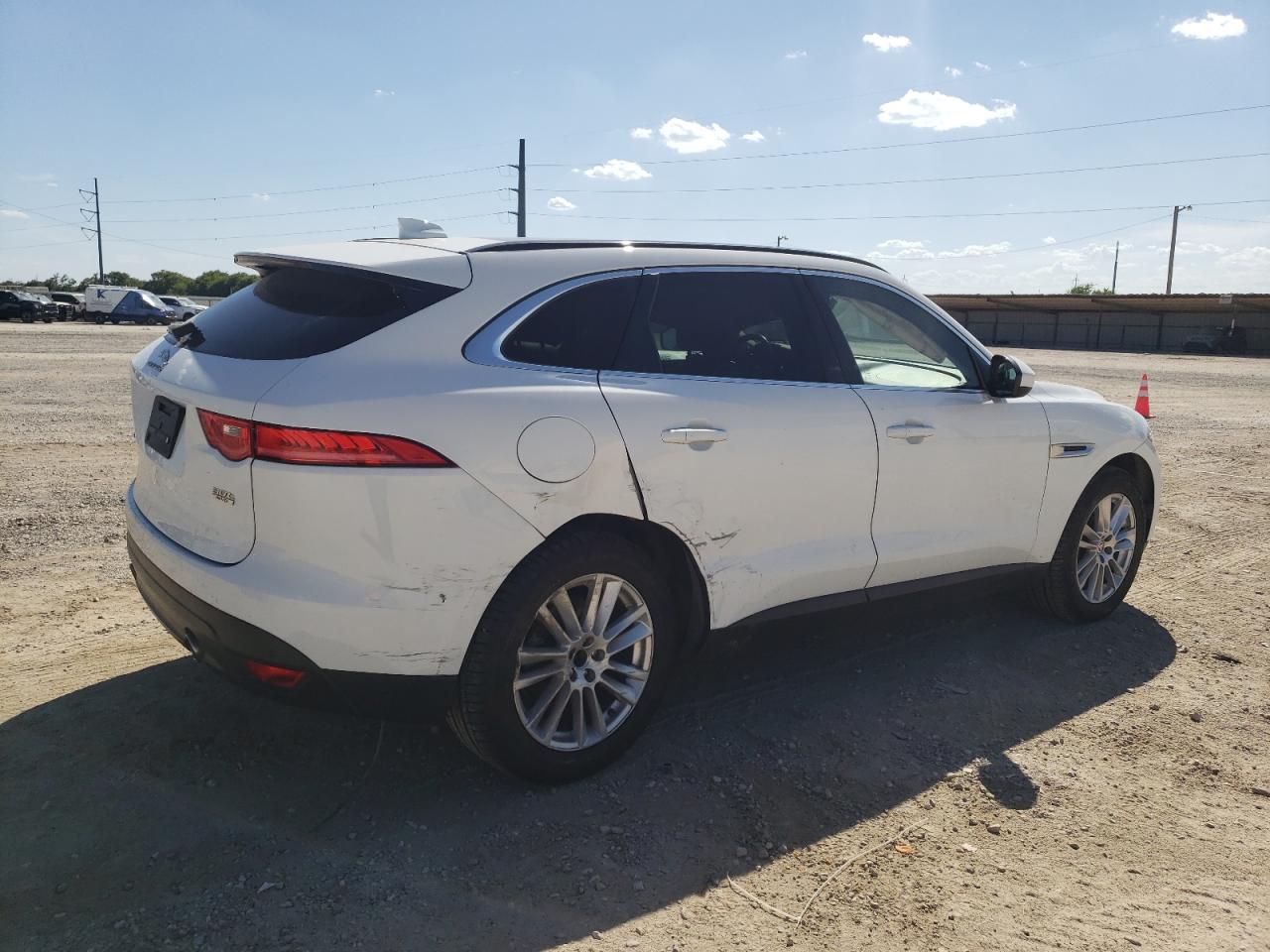 2019 Jaguar F-Pace VIN 5ADCK2GX8KA359314 Copart auction photo, side damage thumbnail 3