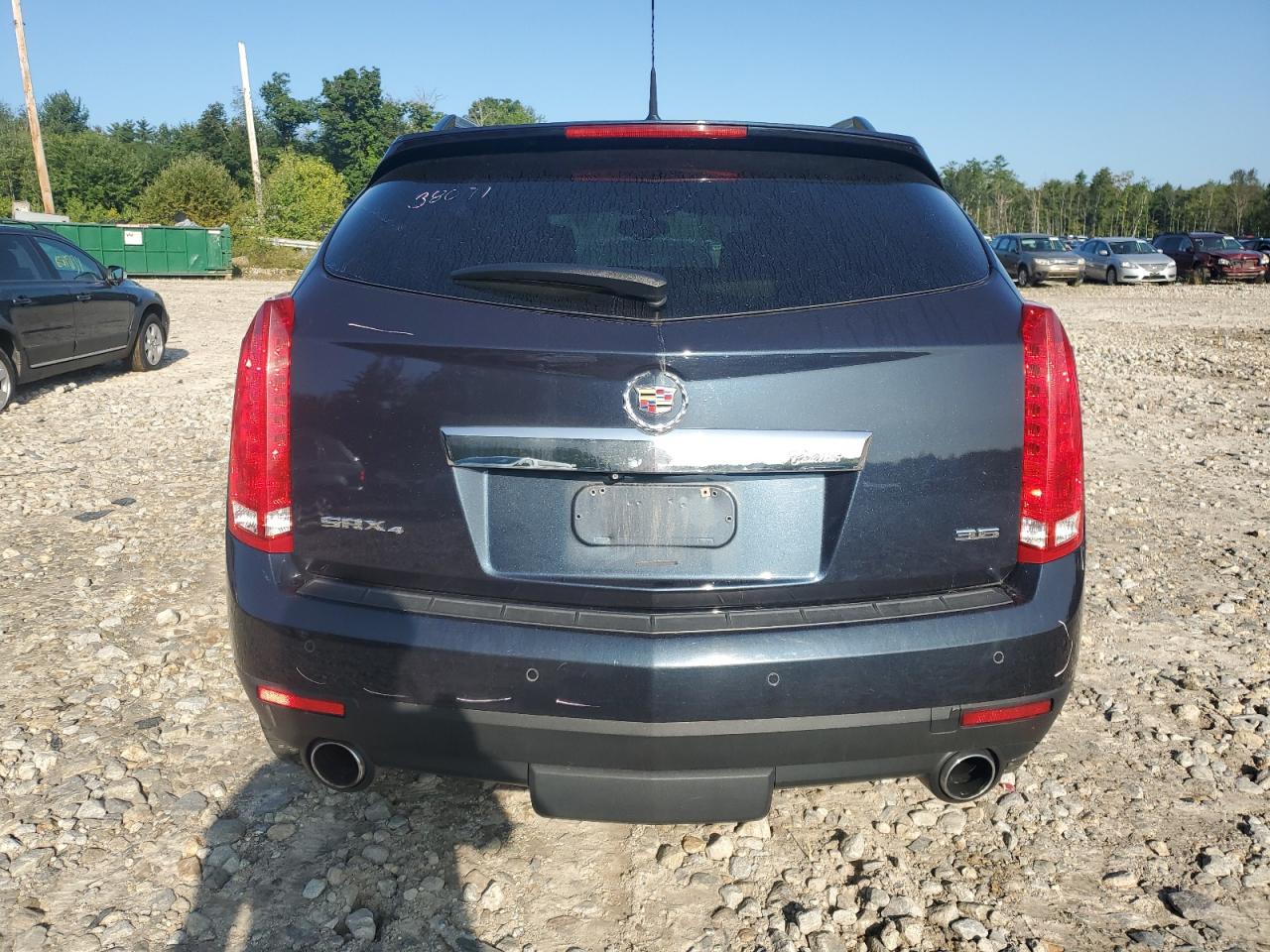 2014 Cadillac SRX VIN 3GYFNEE32ES651572 Copart auction photo, front end / minor dent/scratches damage thumbnail 6