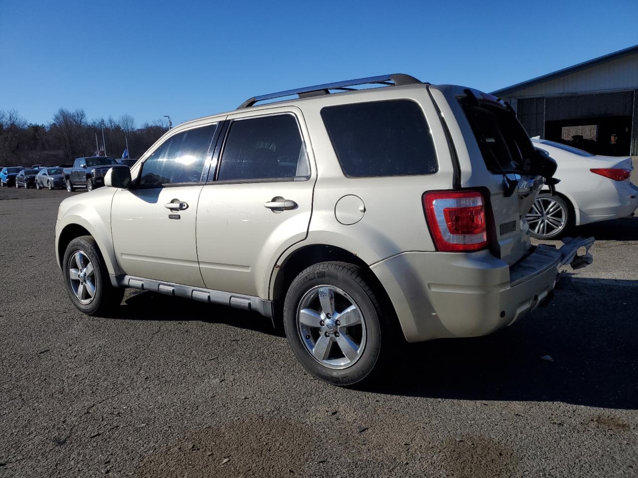 2010 Ford Escape VIN 1FMCU9EG4AKC61211 Copart auction photo, rear end damage thumbnail 2