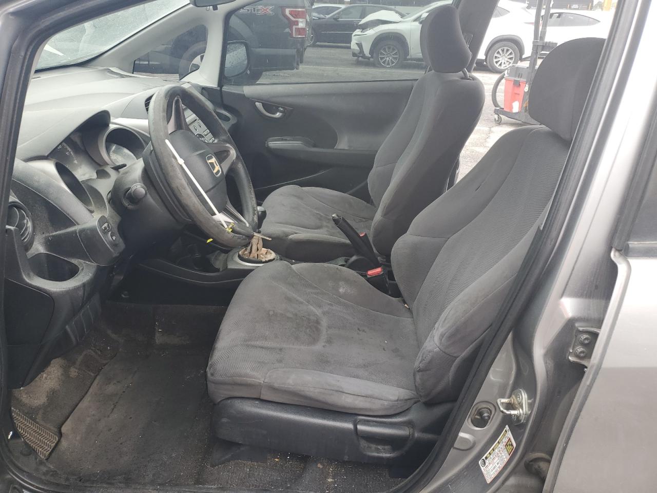 2009 Honda Fit VIN JHMGE87219S037631 Copart auction photo, rear end / side damage thumbnail 7
