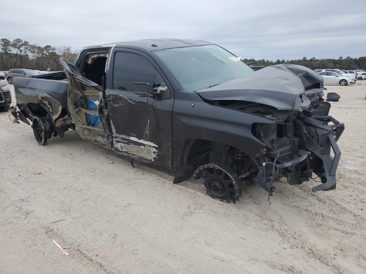 2014 Toyota Tundra VIN 5TFRM5F14EX072097 Copart auction photo, all over damage thumbnail 4