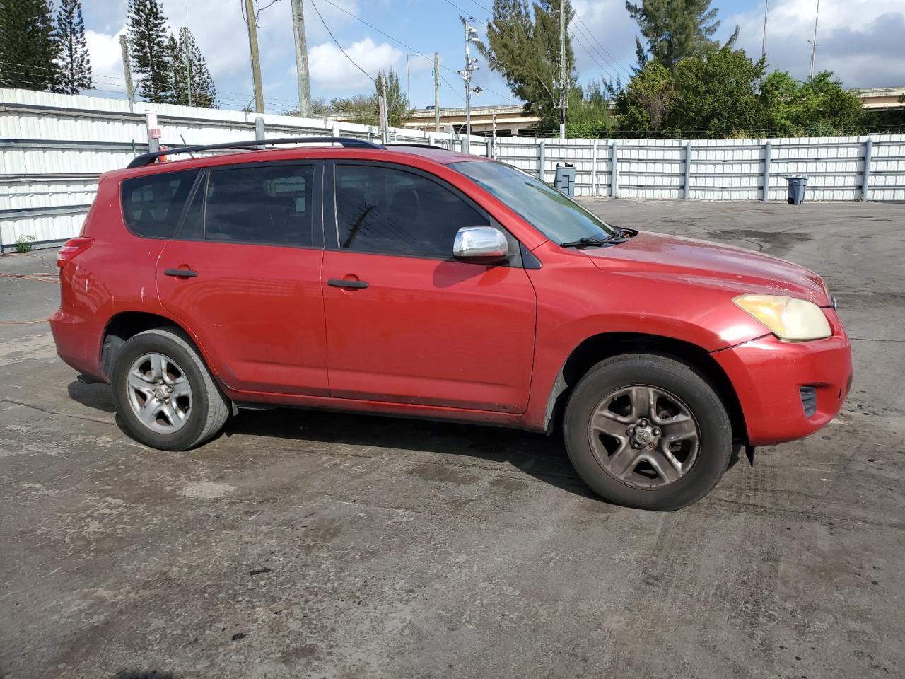 2010 Toyota RAV 4 VIN JTMBF4DV6A5029849 Copart auction photo, side / rear end damage thumbnail 4