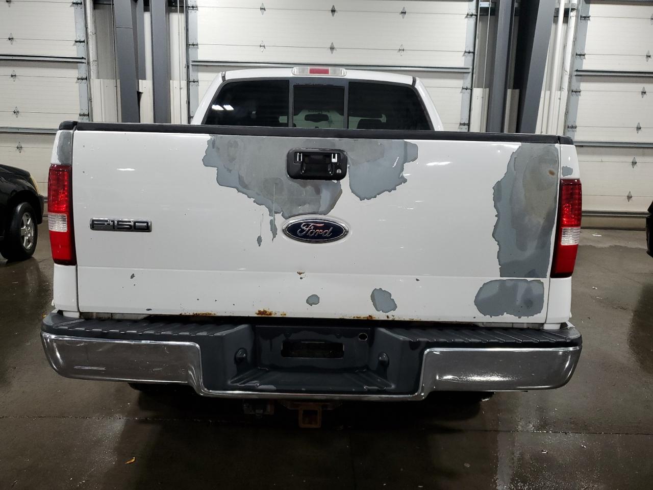 2004 Ford F-150 VIN 1FTPW14554KA84464 Copart auction photo, burn damage thumbnail 6