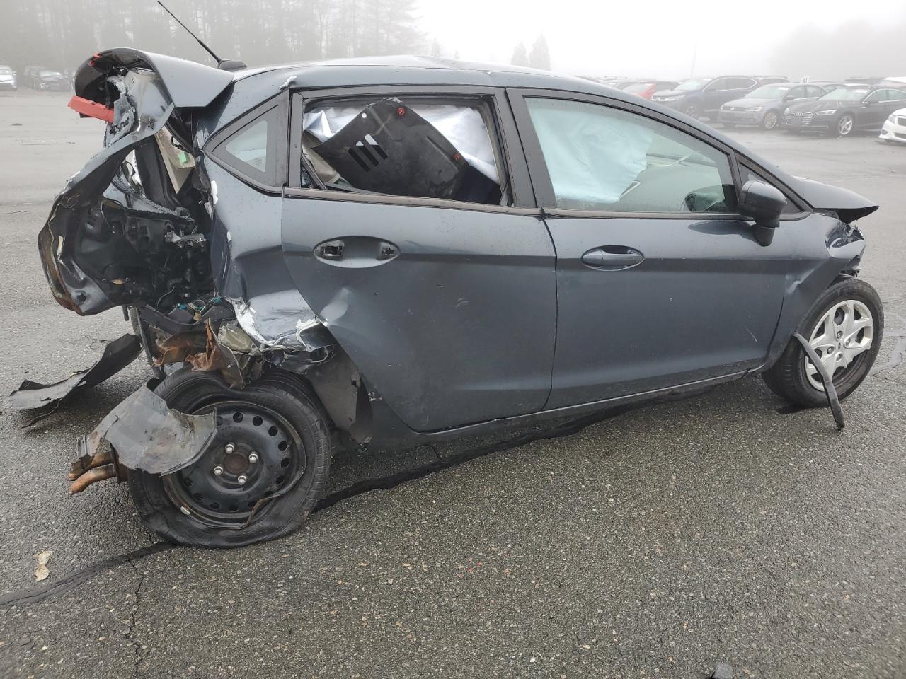 2011 Ford Fiesta VIN 3FADP4EJ7BM122771 Copart auction photo, rear end / all over damage thumbnail 3