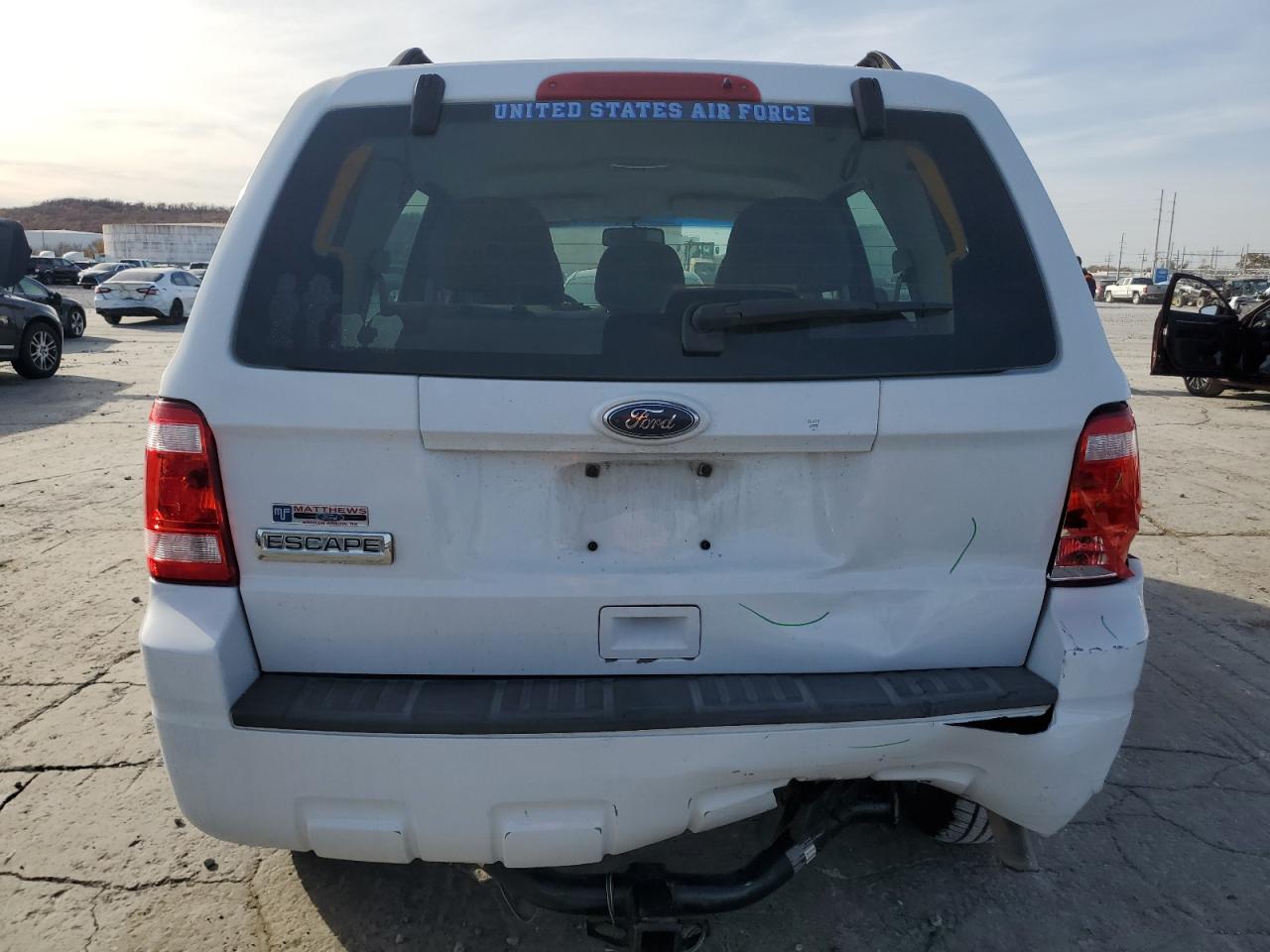 2010 Ford Escape VIN 1FMCU9C71AKC77613 Copart auction photo, rear end damage thumbnail 6