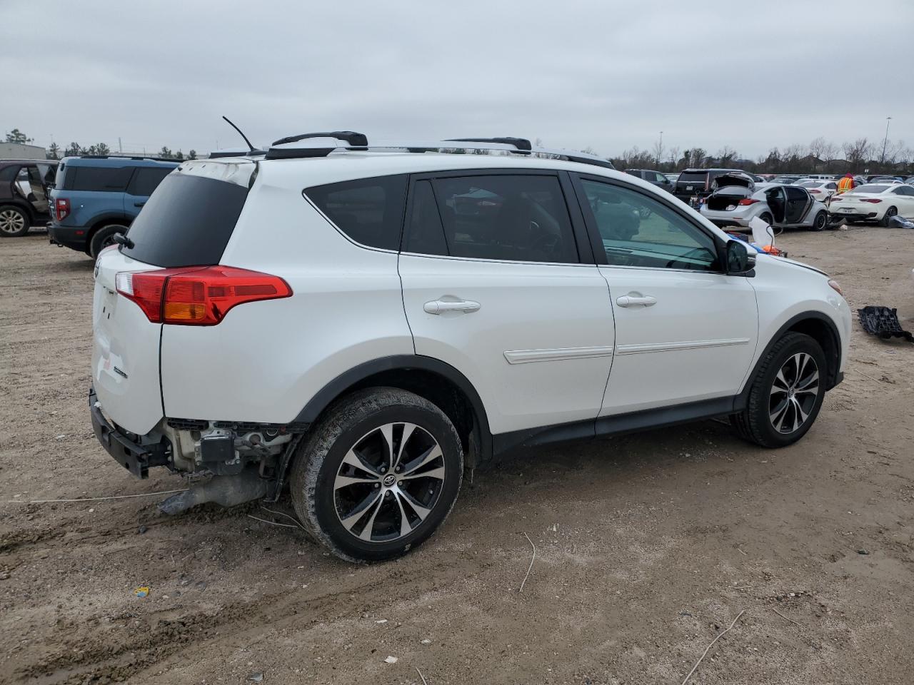 2015 Toyota RAV 4 VIN 2T3YFREV2FW207522 Copart auction photo, rear end / side damage thumbnail 3
