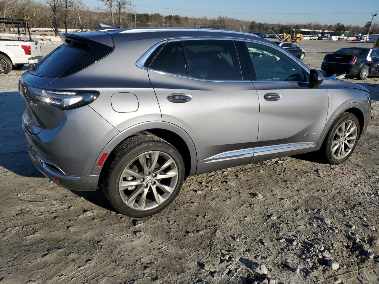 2022 Buick Envision VIN LRBFZRR40ND070462 Copart auction photo, side / front end damage thumbnail 3