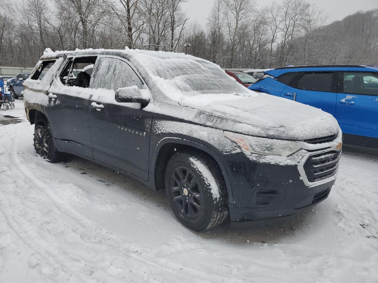 2019 Chevrolet Traverse VIN 1GNEVFKW4KJ122831 Copart auction photo, burn - interior / all over damage thumbnail 4