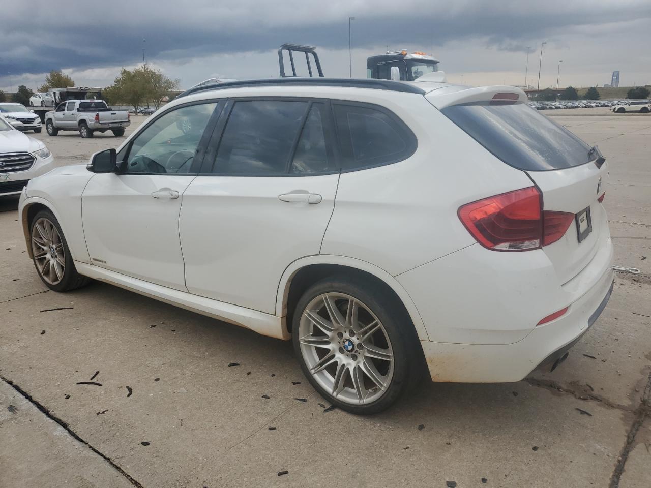 2015 BMW X1 VIN WBAVM1C58FV314995 Copart auction photo, front end / minor dent/scratches damage thumbnail 2