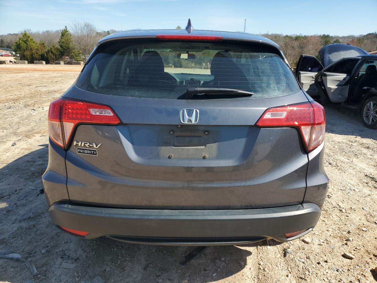 2016 Honda HR-V VIN 3CZRU5H3XGM740910 Copart auction photo, side damage thumbnail 6