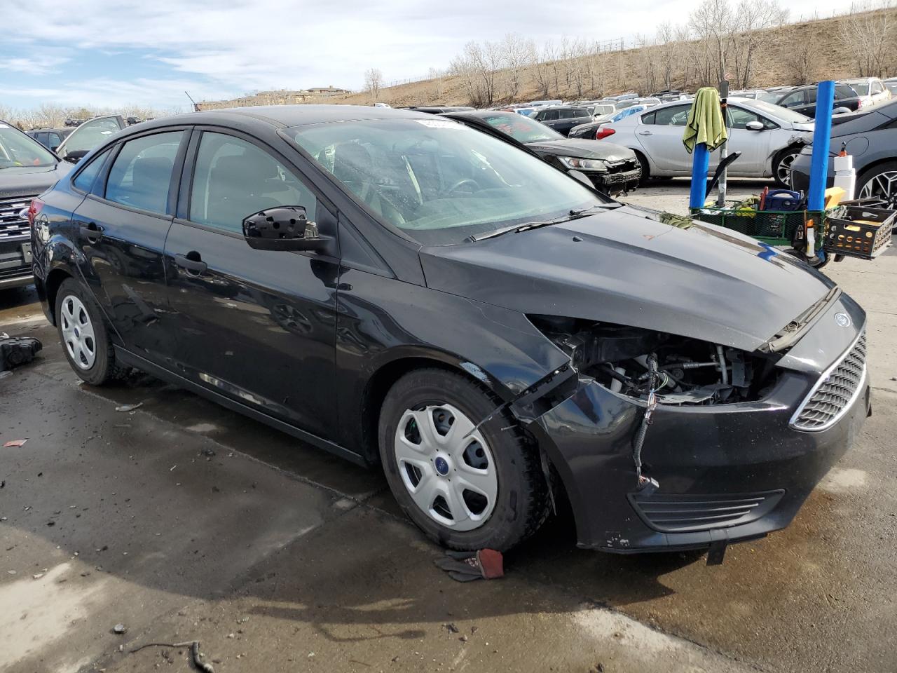 2015 Ford Focus VIN 1FADP3E21FL220351 Copart auction photo, front end / side damage thumbnail 4