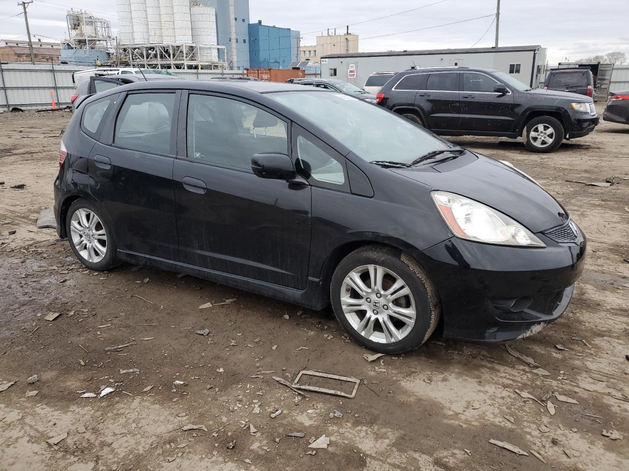 2010 Honda Fit VIN JHMGE8H42AS003900 Copart auction photo, side / rear end damage thumbnail 4