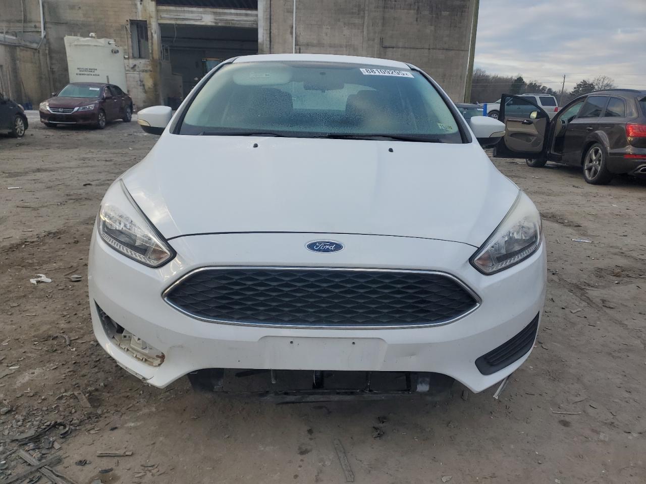 2015 Ford Focus VIN 1FADP3F28FL382346 Copart auction photo, front end / minor dent/scratches damage thumbnail 5