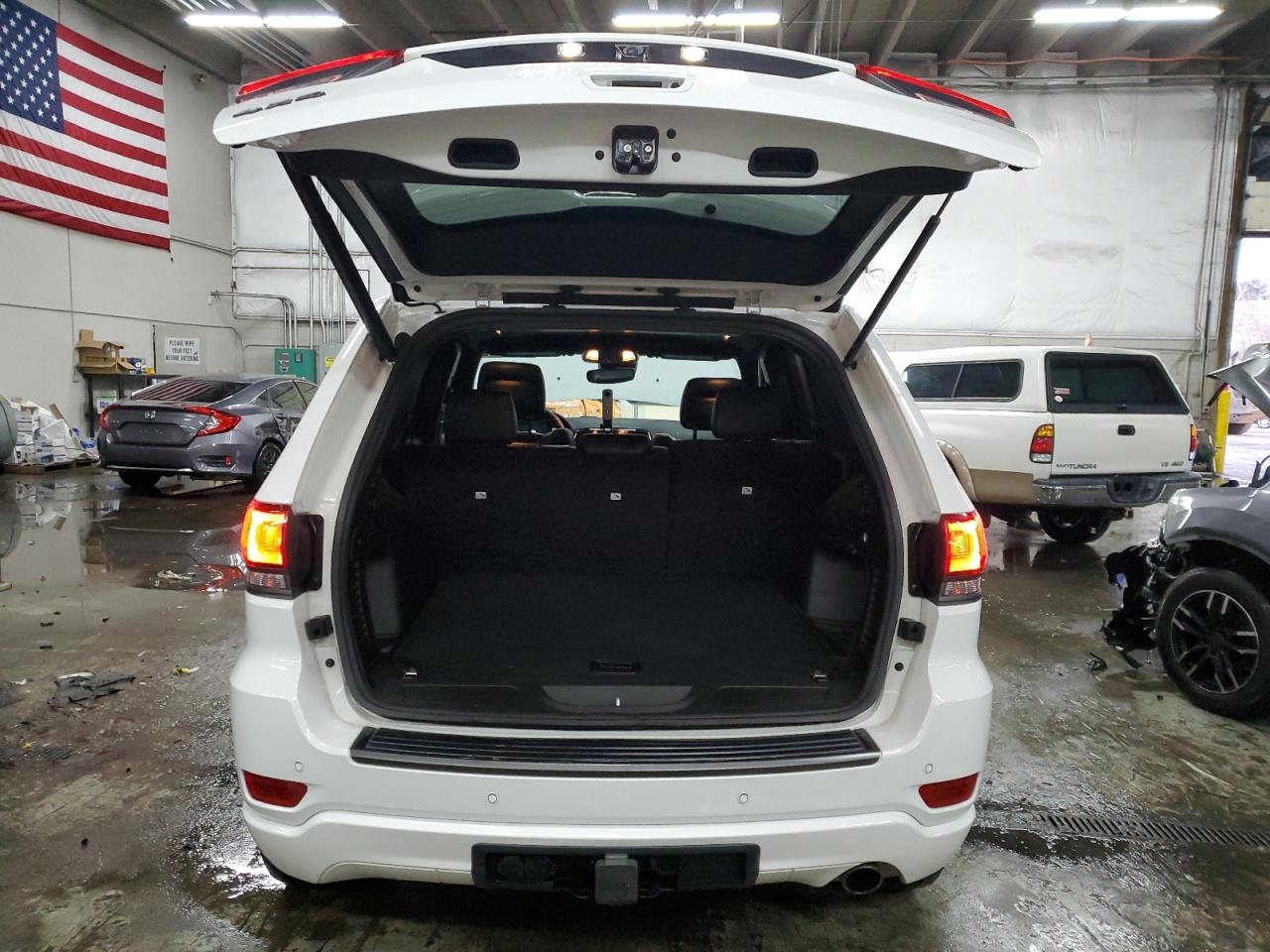 2021 Jeep Grand Cherokee VIN 1C4RJFBG9MC841613 Copart auction photo, side / front end damage thumbnail 6